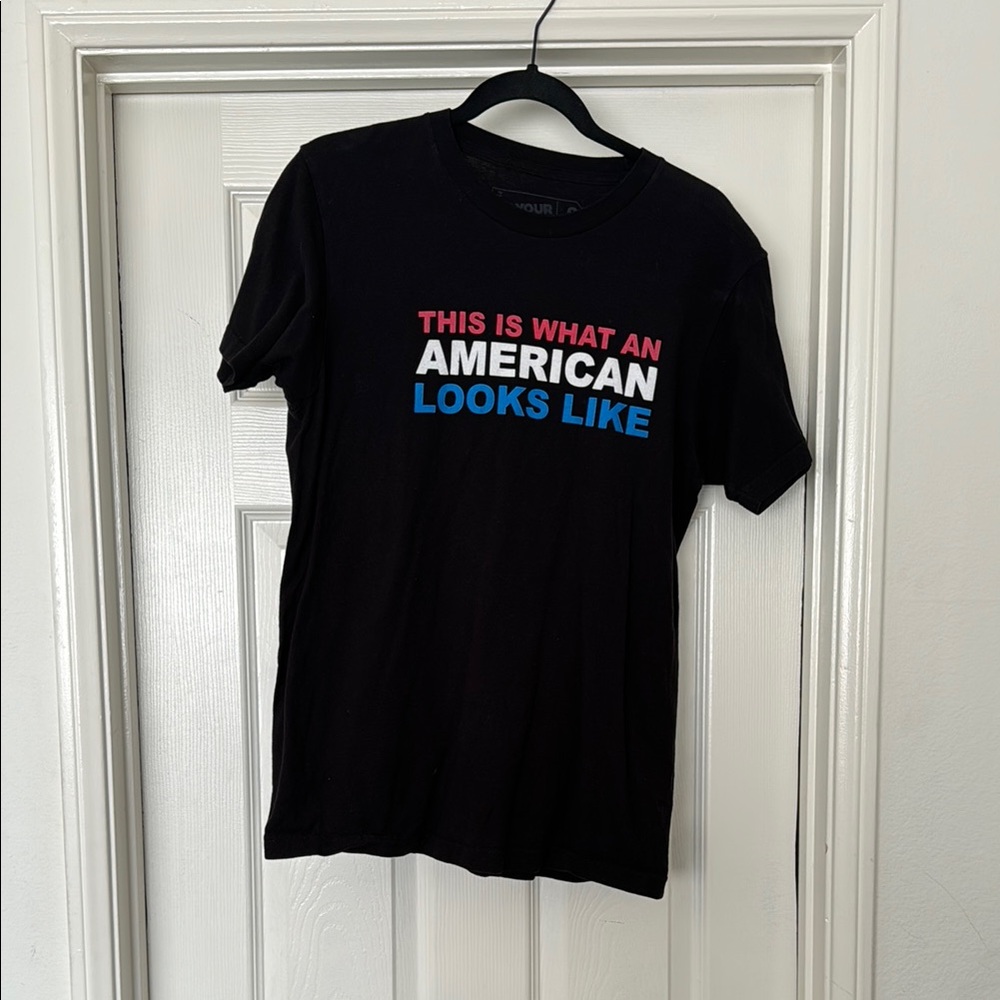 ON YOUR FEET! “THIS IS WHAT AN AMERICAN LOOKS LIKE” T-Shirt